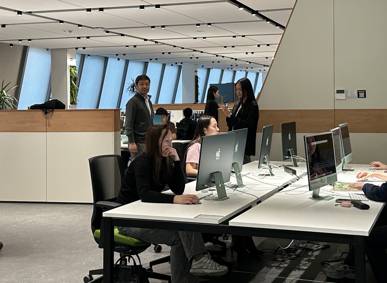 Students of Tomorrow School at Astana Hub experiment with coding. (Lee Jung-joo/The Korea Herald)
