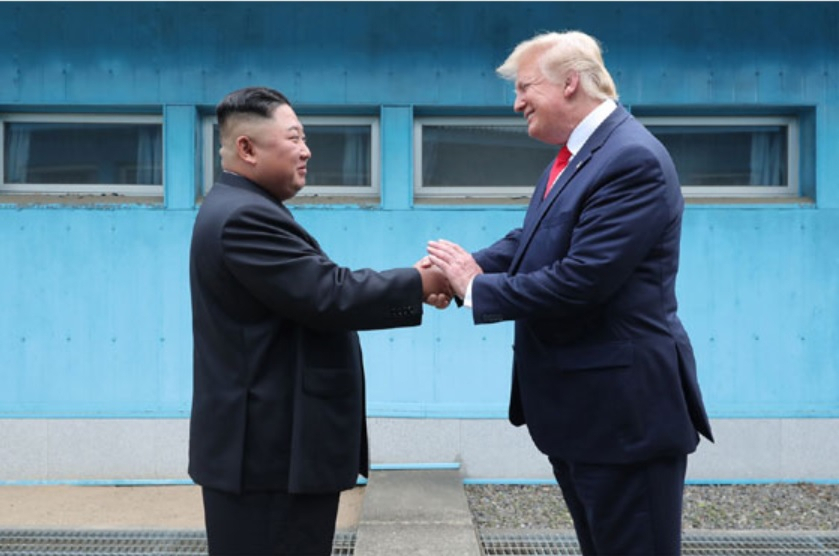 US President Donald Trump and North Korean leader Kim Jong-un greet each other on the North Korean side of the inter-Korean border at Panmunjom on July 30, 2019. (Herald DB)