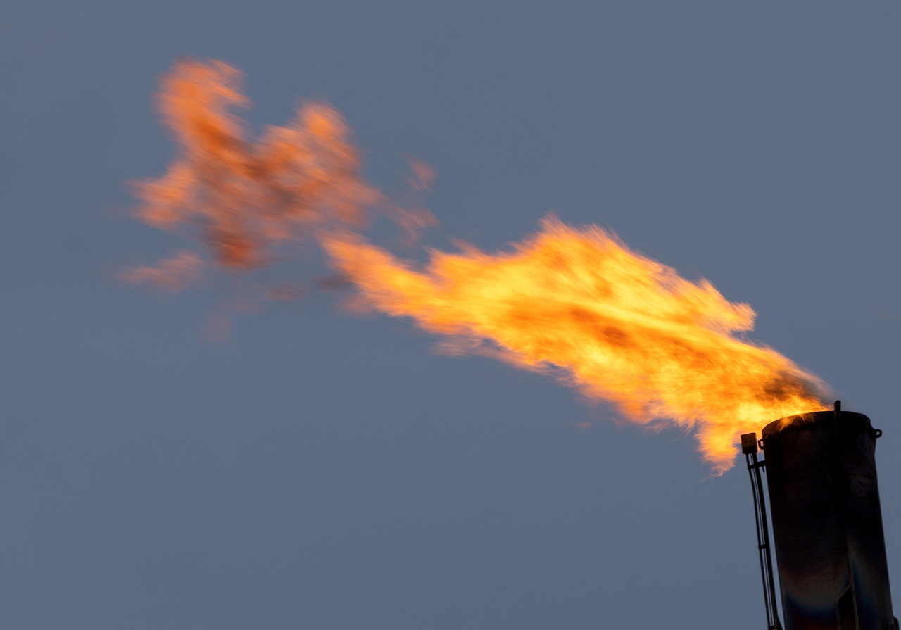Flames blaze from a chimney at a plant in Hammerfest, Norway, in 2024. (Reuters-Yonhap)