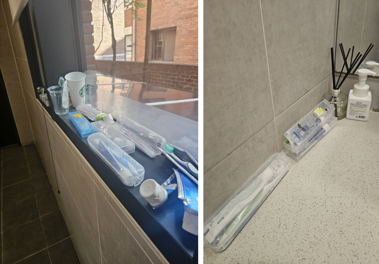 Toothbrushes in transparent plastic cases rest on the windowsill and by the sink in the women’s restroom of a company in Yongsan-gu, Seoul, ready for employees’ after-lunch brushing routine. (Choi Jae-hee / The Korea Herald)