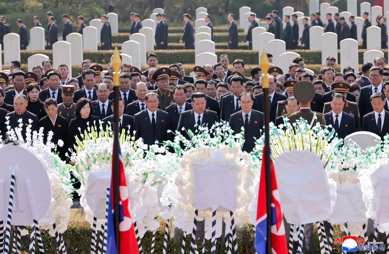 North Korean leader Kim Jong-un (center) attends a state funeral for former ceremonial head of state Kim Yong-nam in Pyongyang on Wednesday, in this photo released by the Korean Central News Agency. (Yonhap)