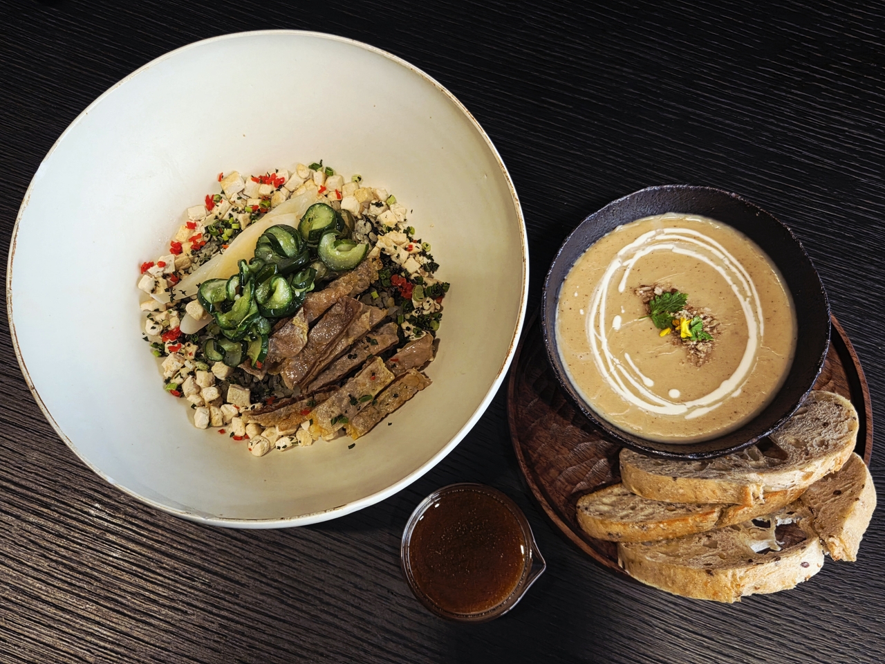 Autumn chestnut soup with Sourdogh Toast (right) and flower herb -beef jeon bibimbap served at Hoam Cafe (Park Yuna/The Korea Herald)