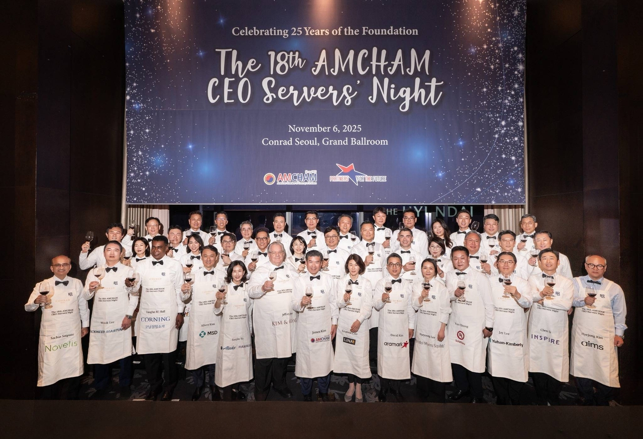 American Chamber of Commerce in Korea CEOs and chief level executives pose for a photo during the 18th AMCHAM CEO Servers’ Night at the Conrad Seoul Hotel on Thursday. (AMCHAM)