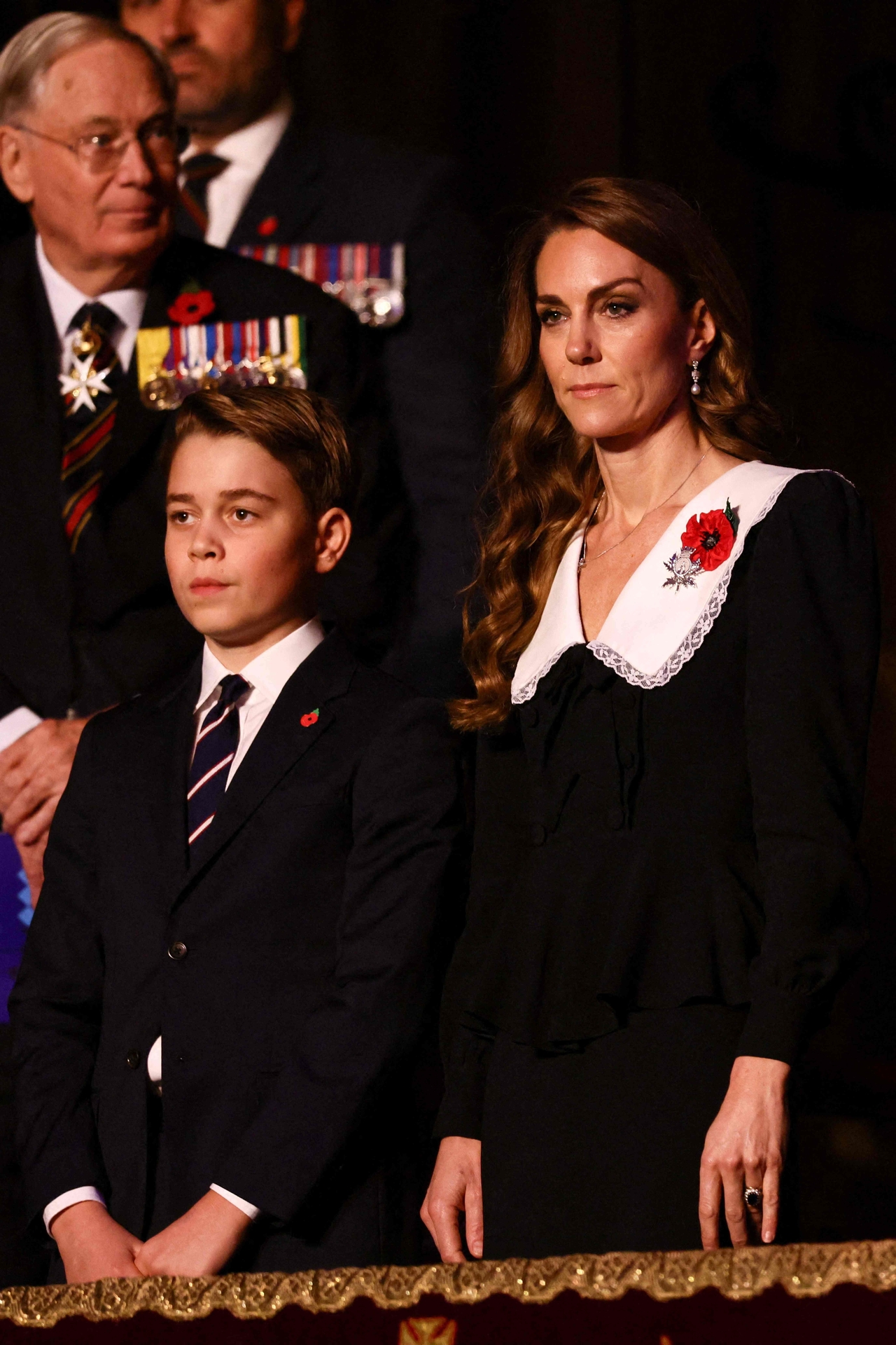Britain's Prince George (left) and his mother Catherine, Princess of Wales, attend the Royal British Legion Festival of Remembrance event at the Royal Albert Hall in London, Saturday.   (AFP-Yonhap)
