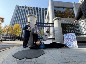 Korean police officers say APEC summit left them 'sleeping like the homeless'