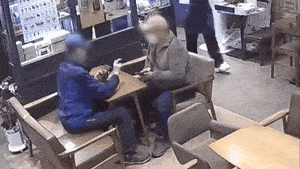 Cafe owner’s sign language greeting warms hearts online