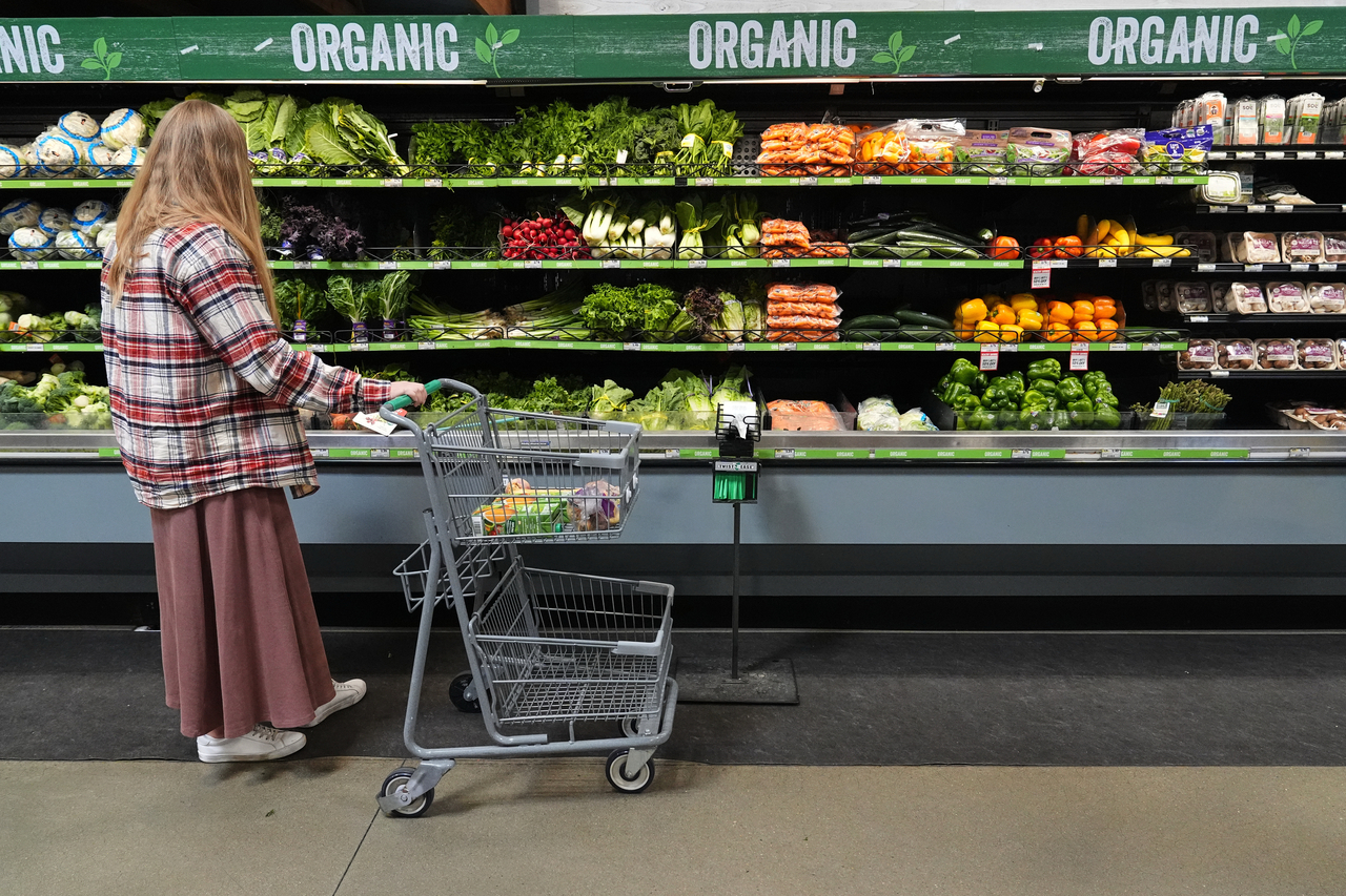 A person shops for produce, which is covered by the USDA Supplemental Nutrition Assistance Program, at a grocery store in Baltimore, Monday.   AP-Yonhap