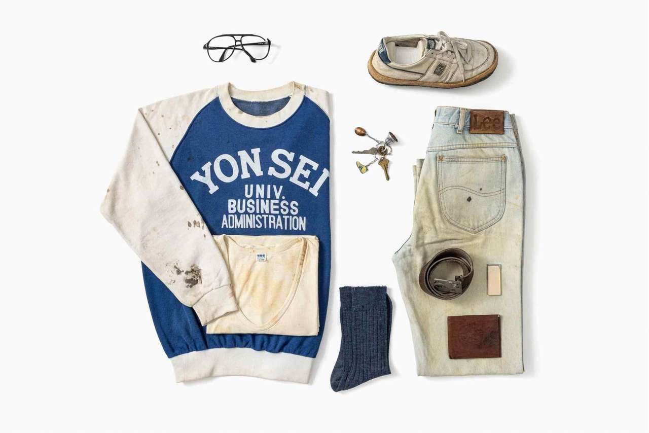 Pictured are the bloodstained sweatshirt, jeans and shoes worn by Lee Han-yeol during a protest in June 1987, when he was fatally injured by riot police. The Korea Heritage Service has designated the items as part of the country’s preliminary cultural heritage. (National Heritage Service)