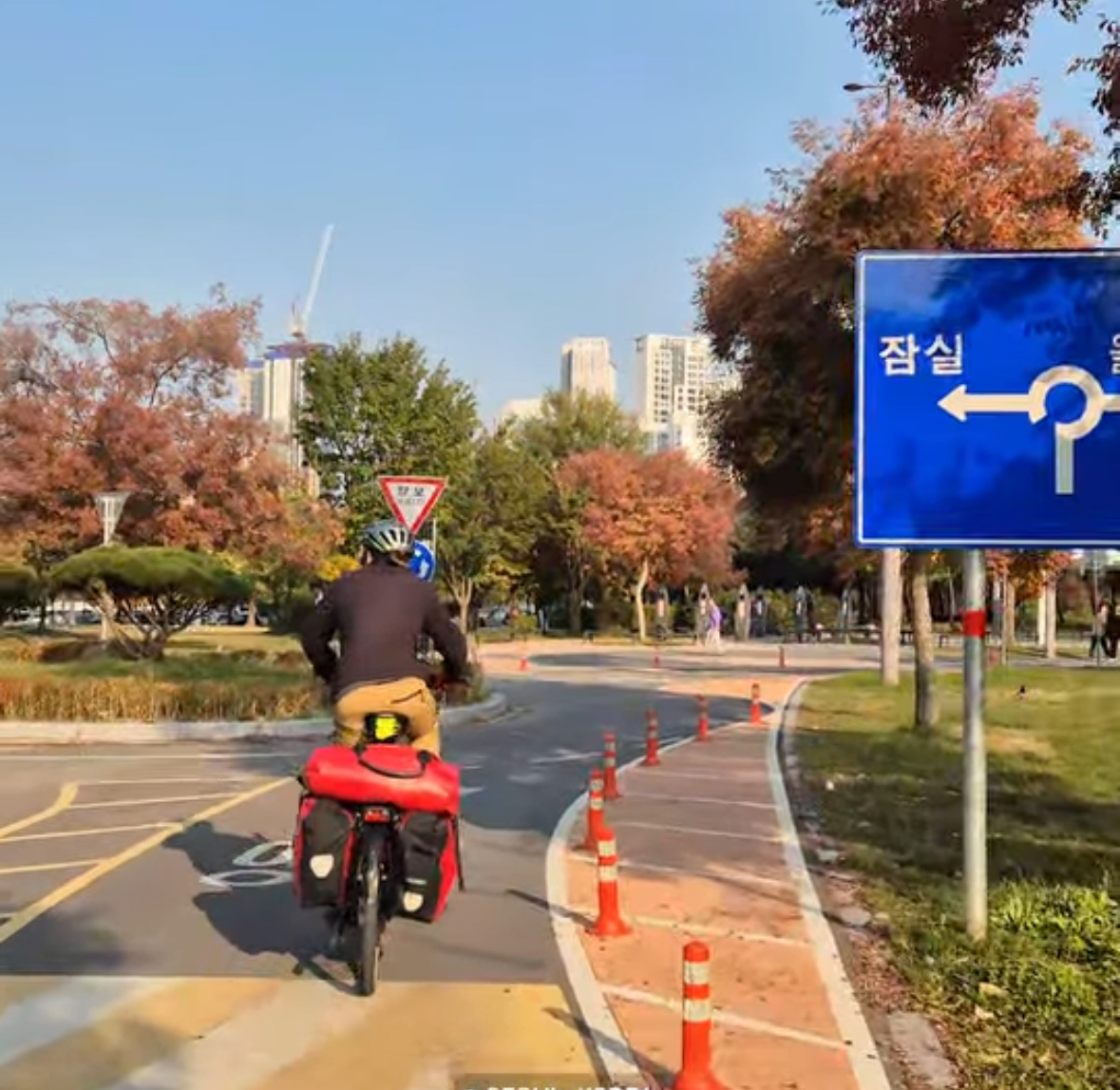 Philipp Springsguth approaches a roundabout for bikes along the Han River in Songpa-gu, Seoul. (Springsguth and West)