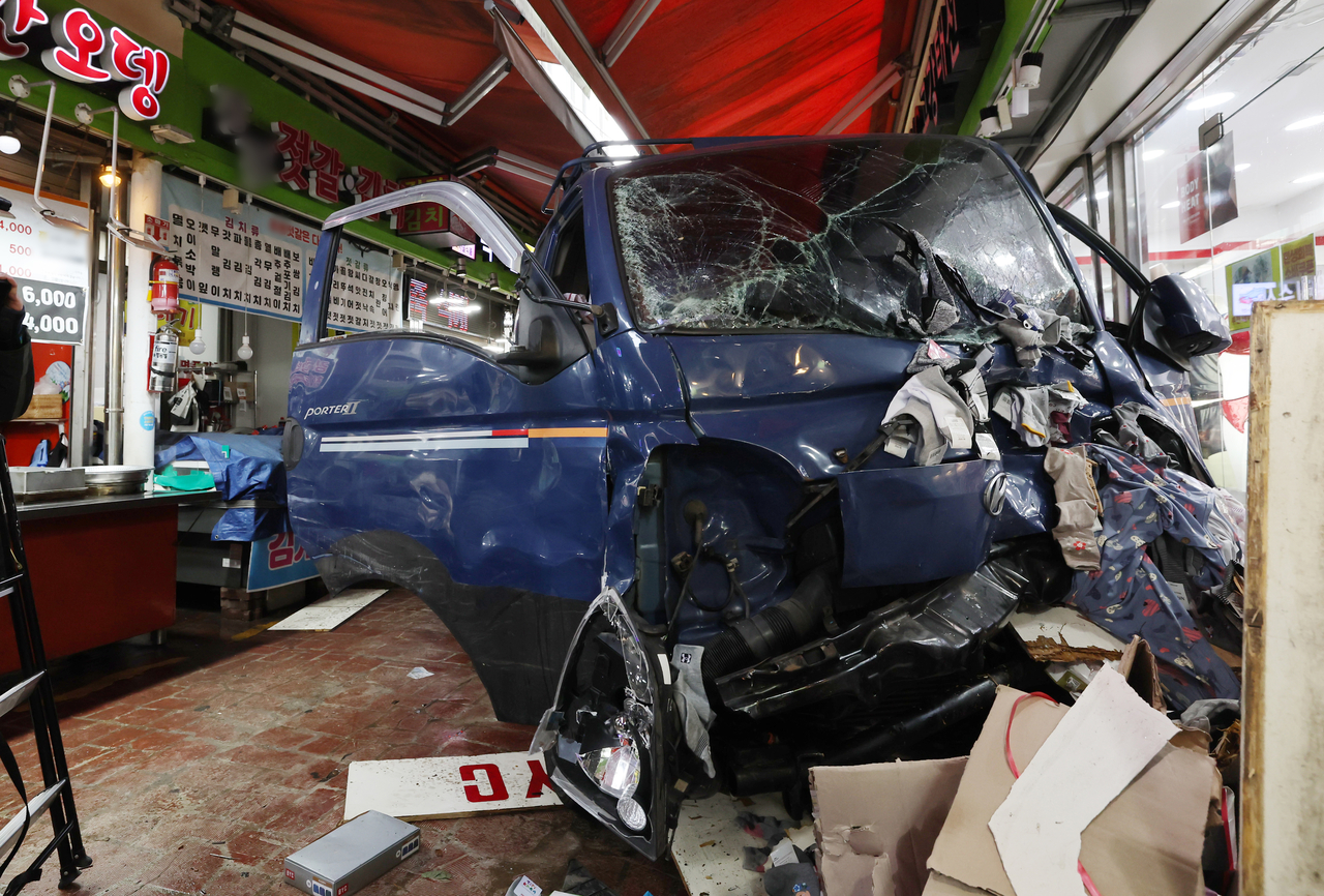 This photo shows the scene of an accident in Bucheon, Gyeonggi Province, where a truck veered off the road and crashed into a traditional market, killing two on Thursday. (Yonhap)
