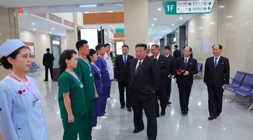 North Korean leader Kim Jong-un (center) attends the opening ceremony of the Pyongyang General Hospital on Oct. 6 to tour the facility, as reported by the North's Korean Central Television. (KCTV-Yonhap)