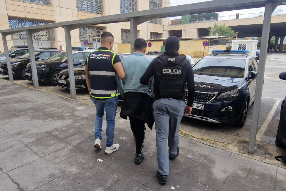 Ecuadorean Wilmer Chavarria is detained in this photo released by Spain's Police authority on Sunday. (AFP-Yonhap)