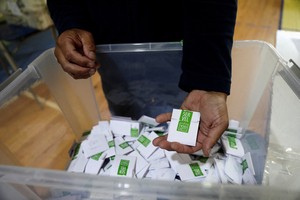 Chile's presidential race headed to tense runoff between communist and hard-right candidates