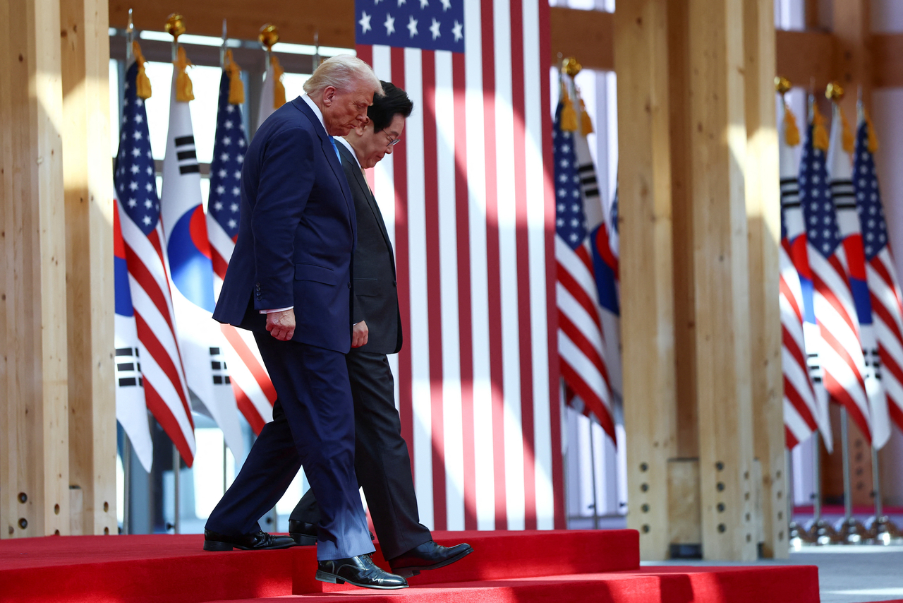 US President Donald Trump walks with South Korean President Lee Jae Myung during a meeting on the sidelines of the Asia-Pacific Economic Cooperation leaders' summit in Gyeongju, North Gyeongsang Province, on Oct.29. (Reuters)