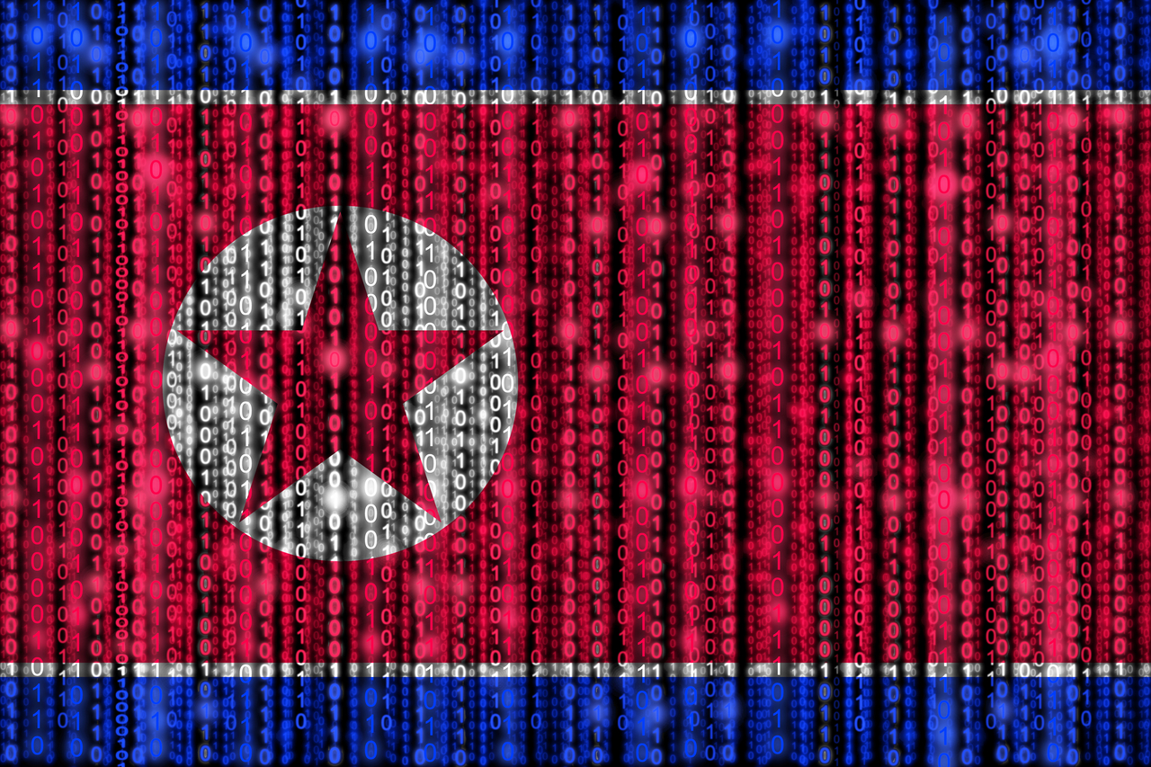 North Korean flag texture with digital zeros and ones strains glowing in the national colors. (123RF)