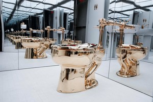 Fully functional, solid gold toilet sells for $12.1m