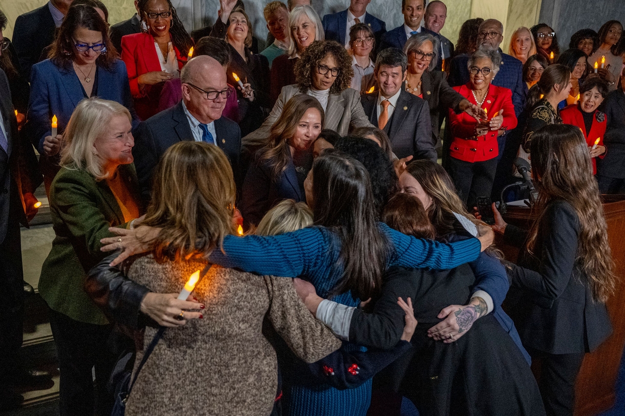 Victims of convicted sex offender Jeffrey Epstein share a hug after learning that the US Senate passed the "Epstein Files Transparency Act" in Washington, Tuesday. (AFP-Yonhap)