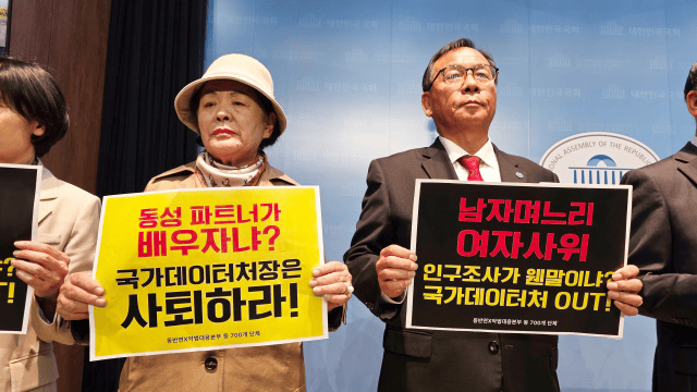 Opposition groups stage a press event at South Korea’s National Assembly on Oct. 24, criticizing a census policy that allows same-sex partners to register as spouses. The yellow sign reads, “Same-sex partner as spouse? The head of the Ministry of Data and Statistics must resign.” (Coalition Against Homosexuality and Same-Sex Marriage)