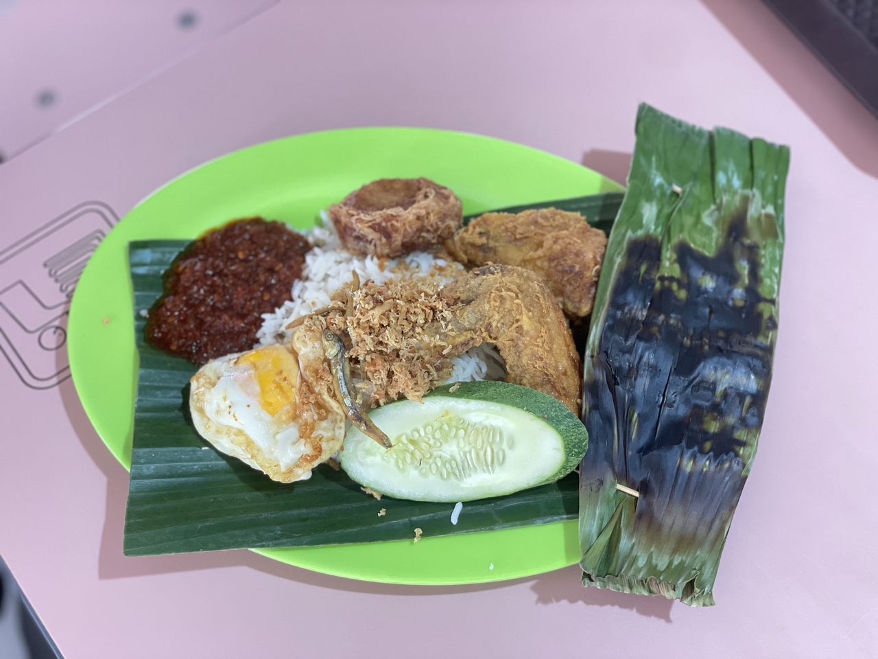 Nasi lemak, a fragrant Malaysian dish of rice cooked in coconut milk, served with a variety of accompaniments (Hong Yoo/The Korea Herald)
