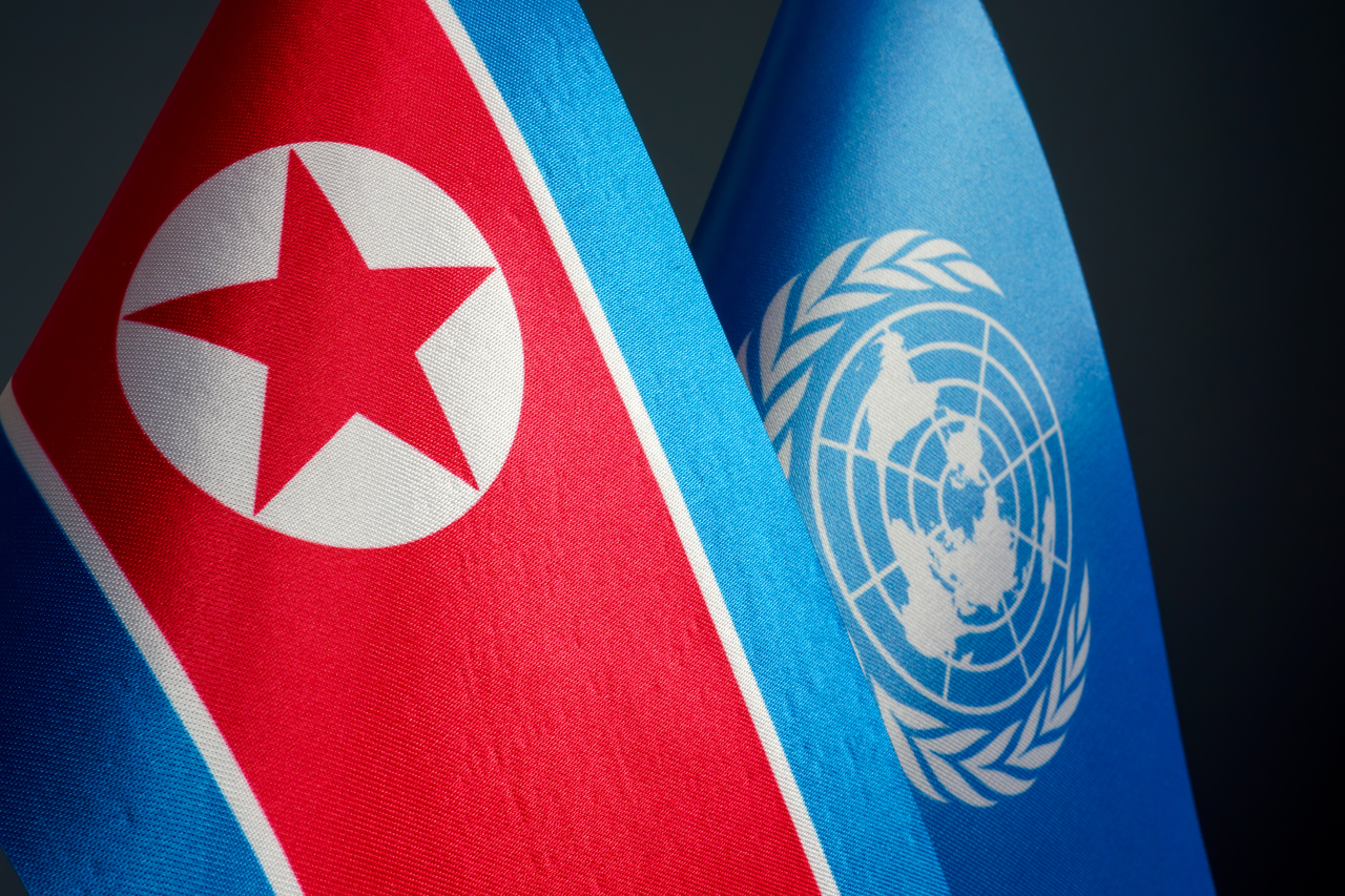 Flags of North Korea and the United Nations. (123rf)