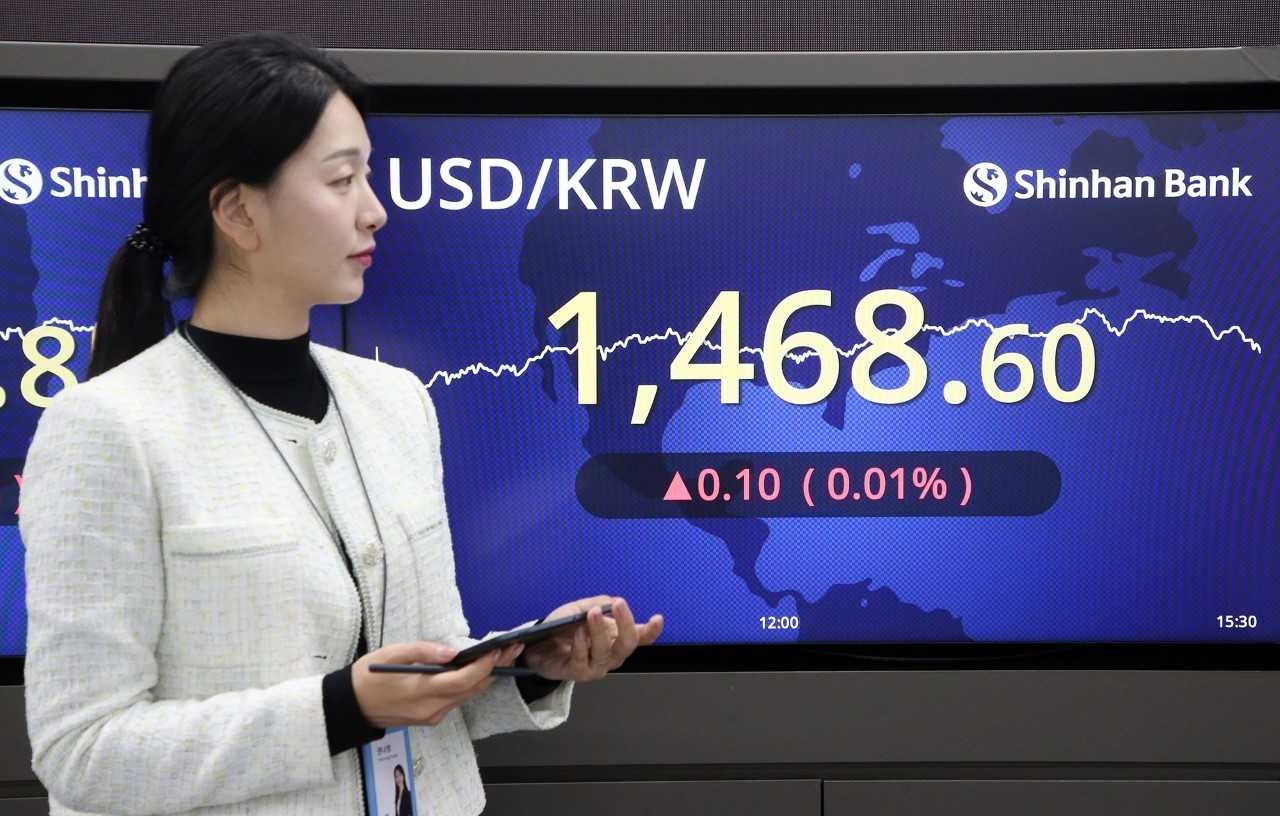 An electronic monitor at Shinhan Bank's dealing room in central Seoul shows the won's value quoted at 1,468.6 per dollar as of daytime trading's close, Thursday. (Shinhan Bank)