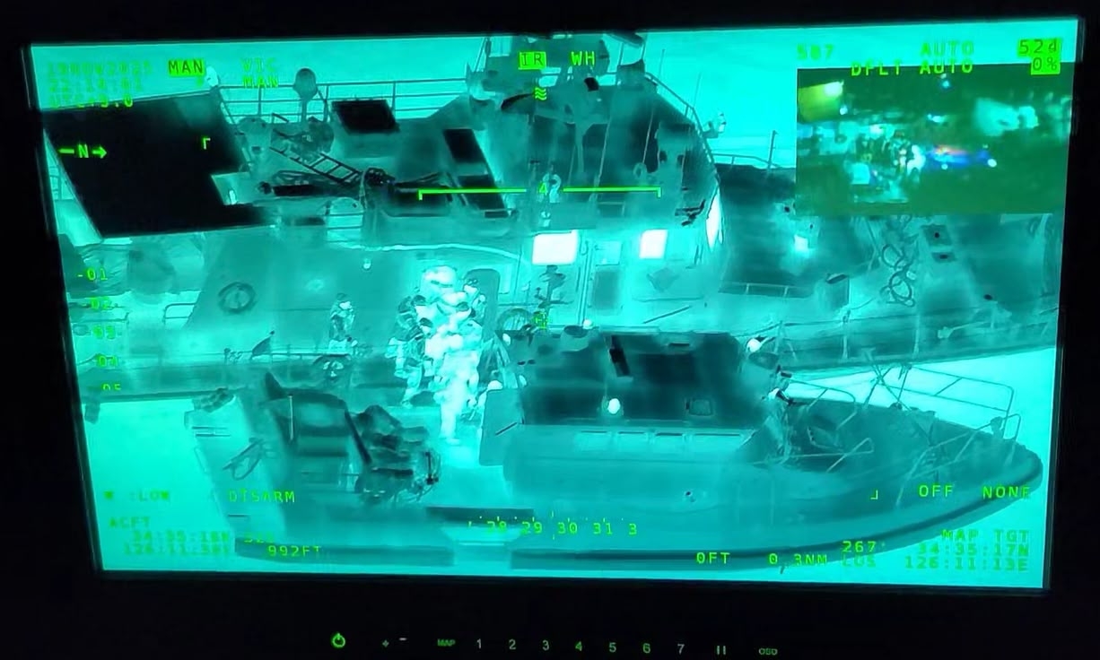 Thermal camera footage shows passengers being assisted onto rescue boats. (Mokpo Coast Guard)