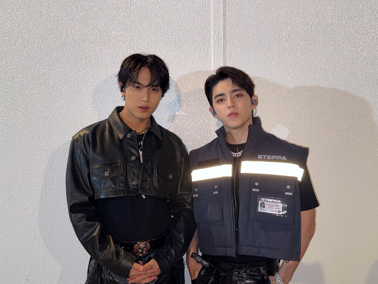 S.Coups and Mingyu, who form Seventeen subunit CxM, pose before the “Dream Concert Abu Dhabi 2025” held at Etihad Park on Yas Island of Abu Dhabi, United Arab Emirates, Saturday. (Pledis Entertainment)