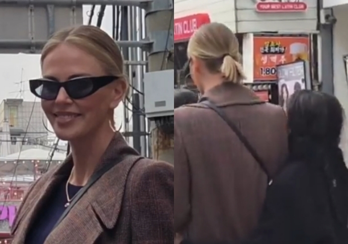 Hollywood star Charlize Theron is spotted in the streets of Hongdae. (Online community)
