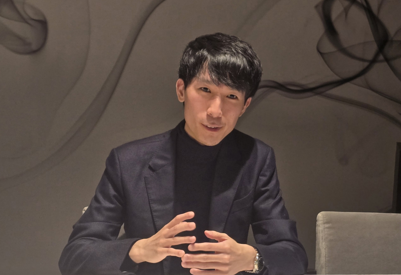 Pianist Eric Lu speaks during an interview with reporters on Monday. (Park Ga-young/The Korea Herald)