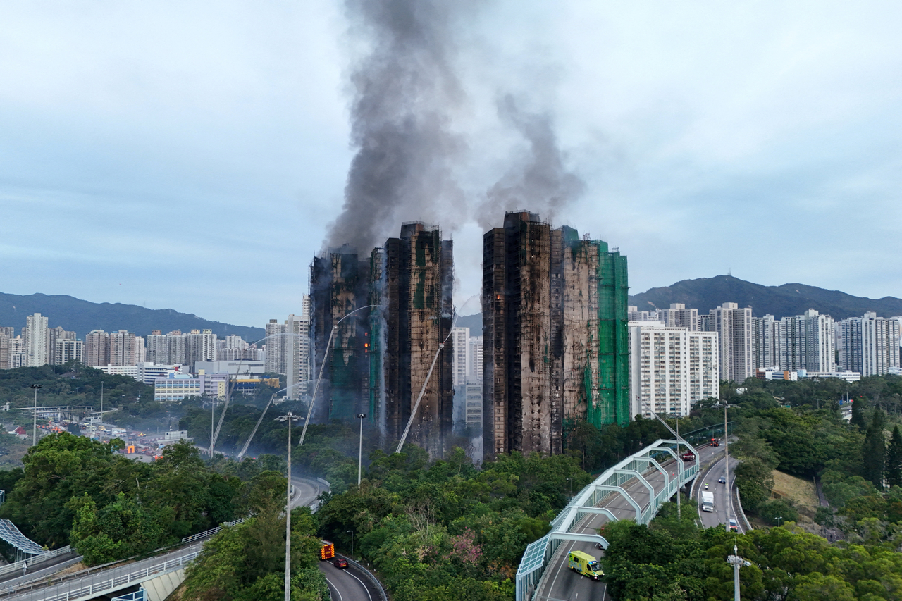 A drone view shows flames and thick smoke rising from the Wang Fuk Court housing estate during a major fire, in Tai Po, Hong Kong, China, on Thursday. (Reuters)