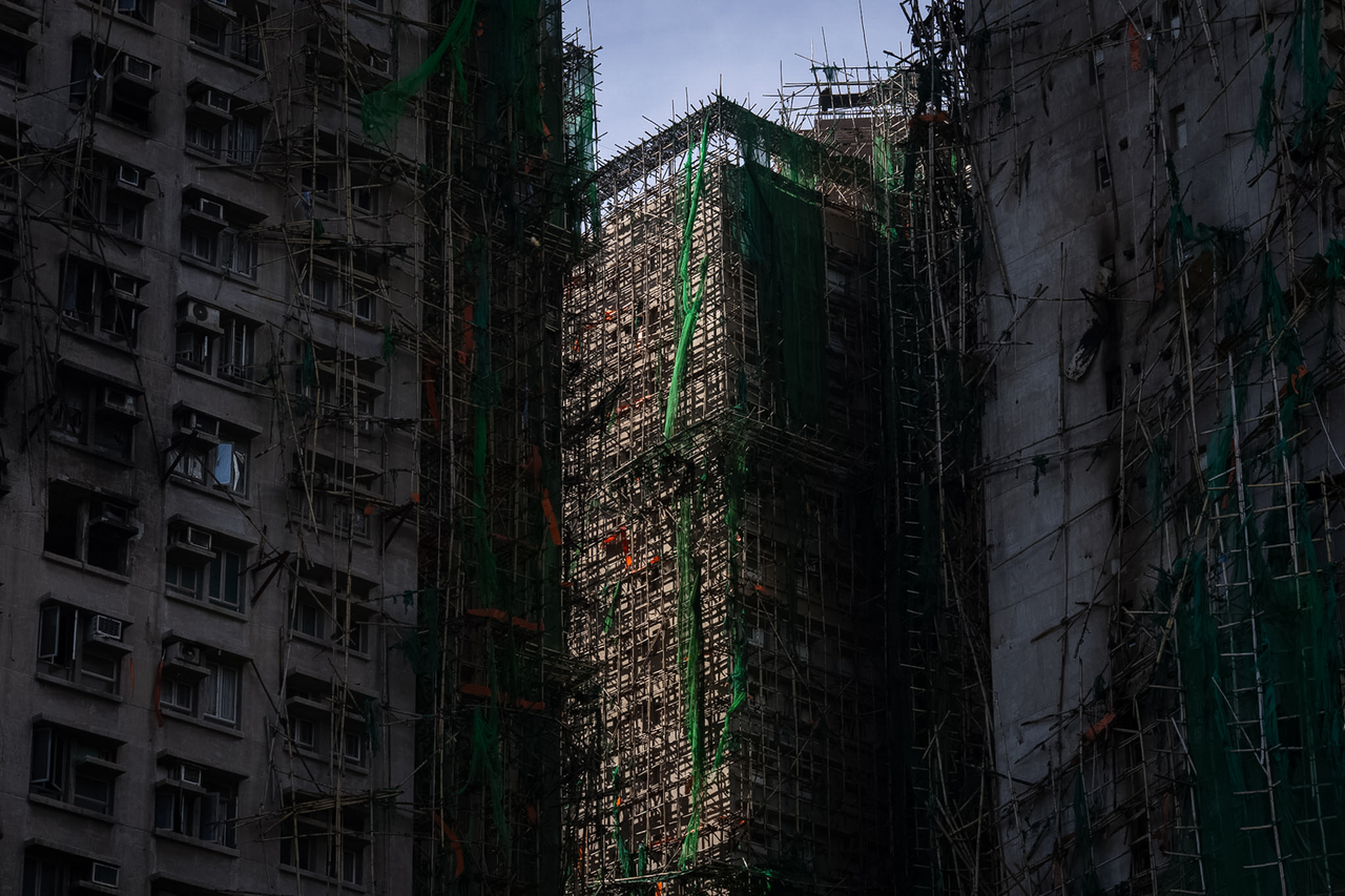 Burned buildings are seen after the deadly fire that started Wednesday at Wang Fuk Court, a residential estate in Tai Po district, Hong Kong, on Friday. (AP-Yonhap)