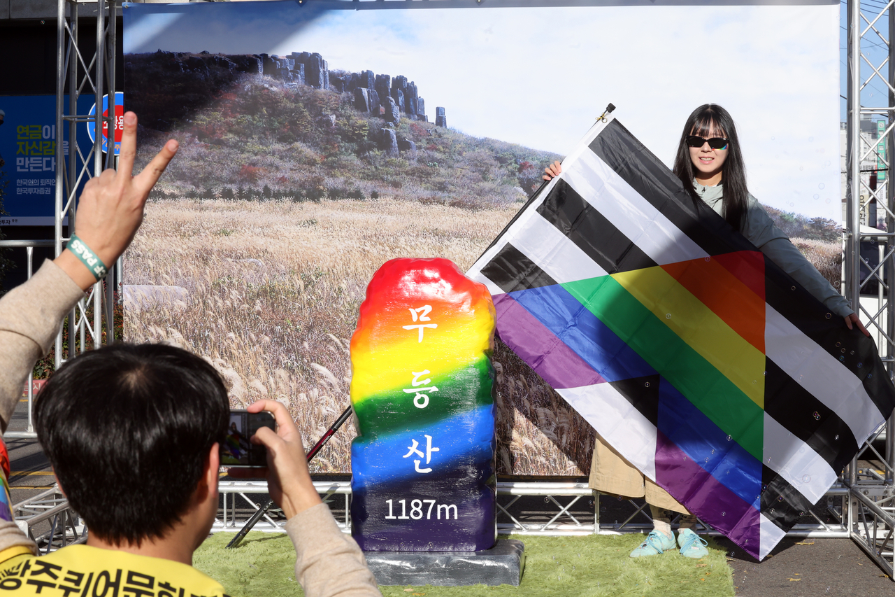 A participant poses for a photo during the Gwangju Queer Culture Festival held along Geumnam-ro in Dong-gu, Gwangju, on Saturday. (Yonhap)