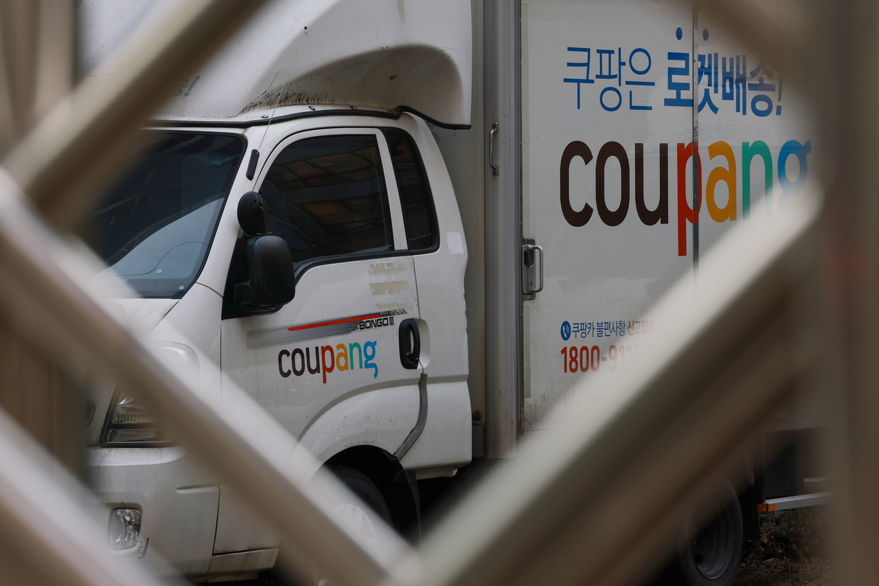 A delivery truck is parked inside a Coupang logistics center in Seoul on Sunday. (Yonhap)