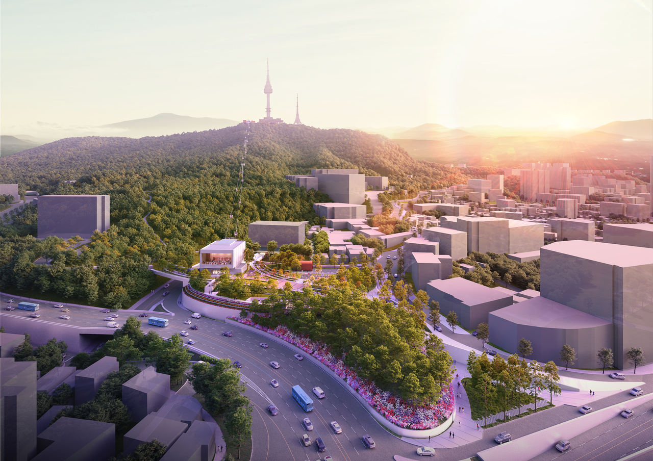 N Seoul Tower atop Namsan mountain seen from above with planned gondola route from Myeongdong, panoramic Seoul cityscape