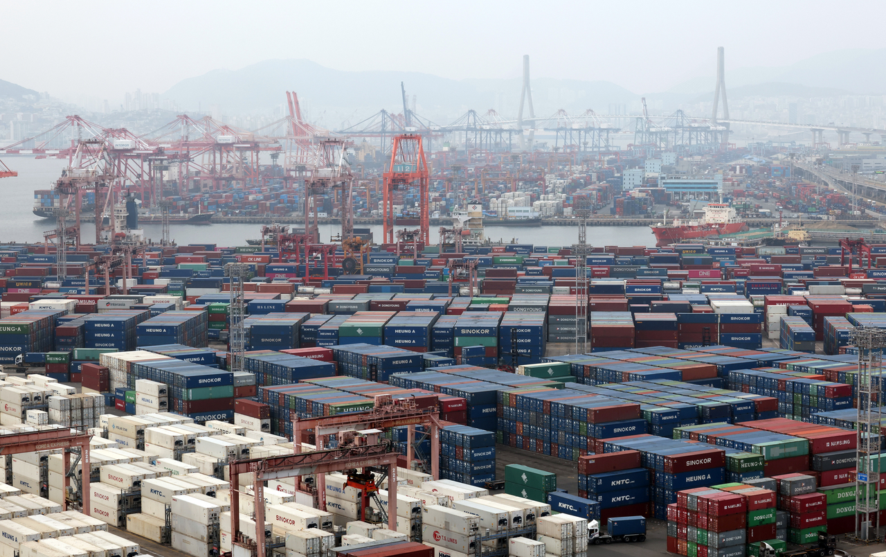 Containers are stacked at a port in the southeastern port city of Busan on Monday. (Yonhap)