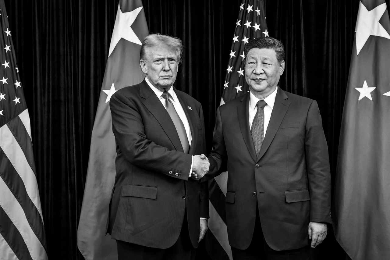US President Donald Trump (left) greets Chinese President Xi Jinping before a bilateral meeting at Gimhae International Airport on Oct. 30 in Busan. (White House)