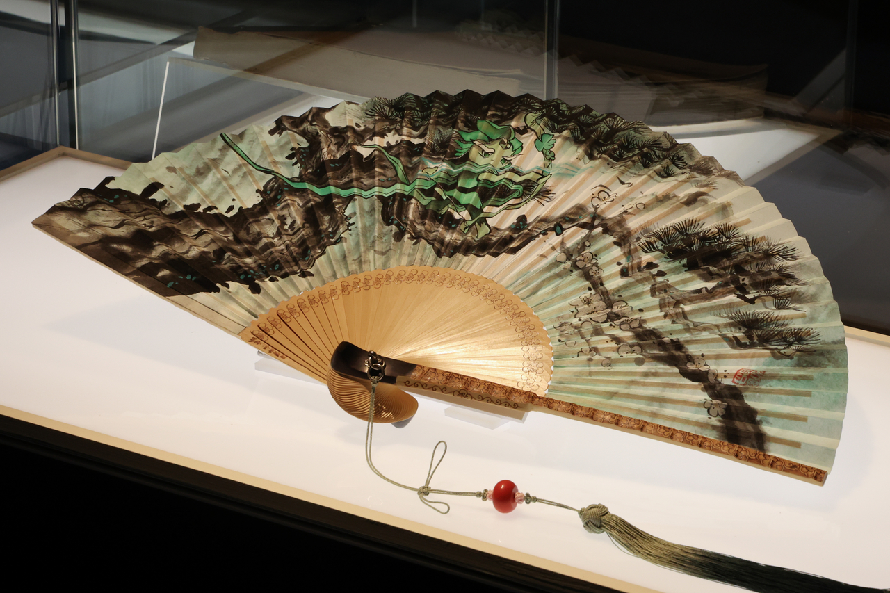A recreated folding fan featuring a Cookie Run character, crafted by a master seonja (traditional fan making) artisan and holder of National Intangible Cultural Heritage (Yonhap)