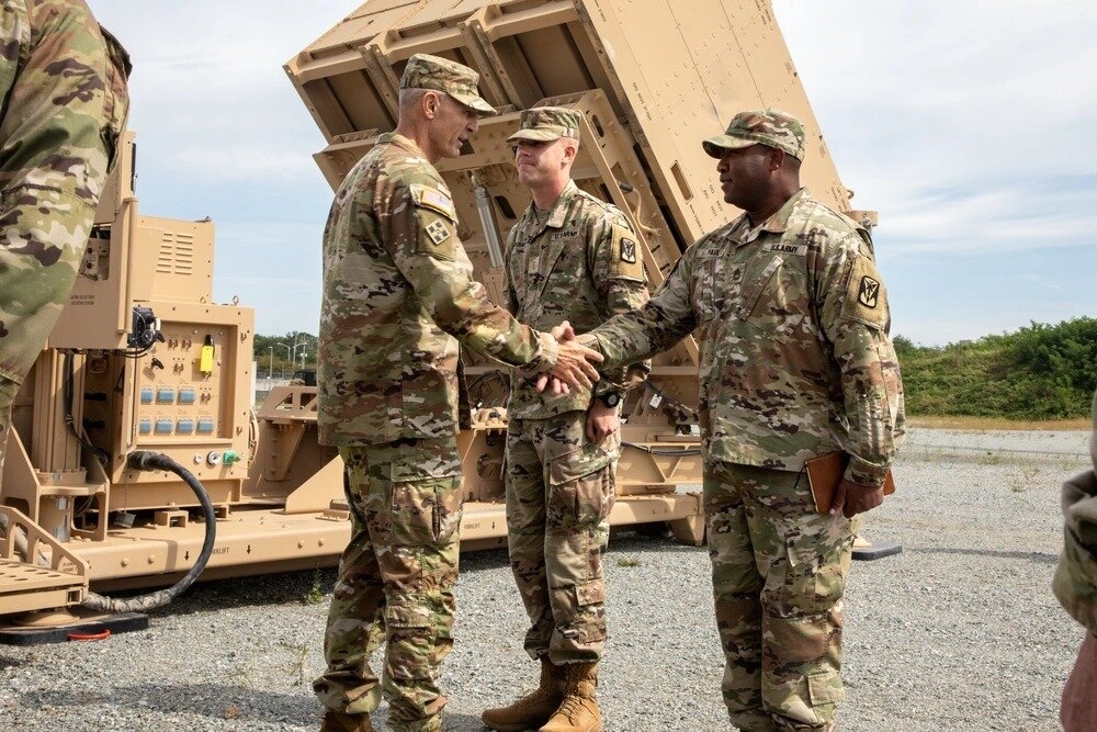 Chief of Staff of the US Army Gen. Randy George (left) meets with leaders from the 35th Air Defense Artillery Brigade and soldiers from the 6th Battalion, 52nd Air Defense Artillery Regiment, in front of the launcher of an Indirect Fire Protection Capability system at a Patriot tactical site at Osan Air Base in Gyeonggi Province, in September. (US Defense Visual Information Distribution Service)