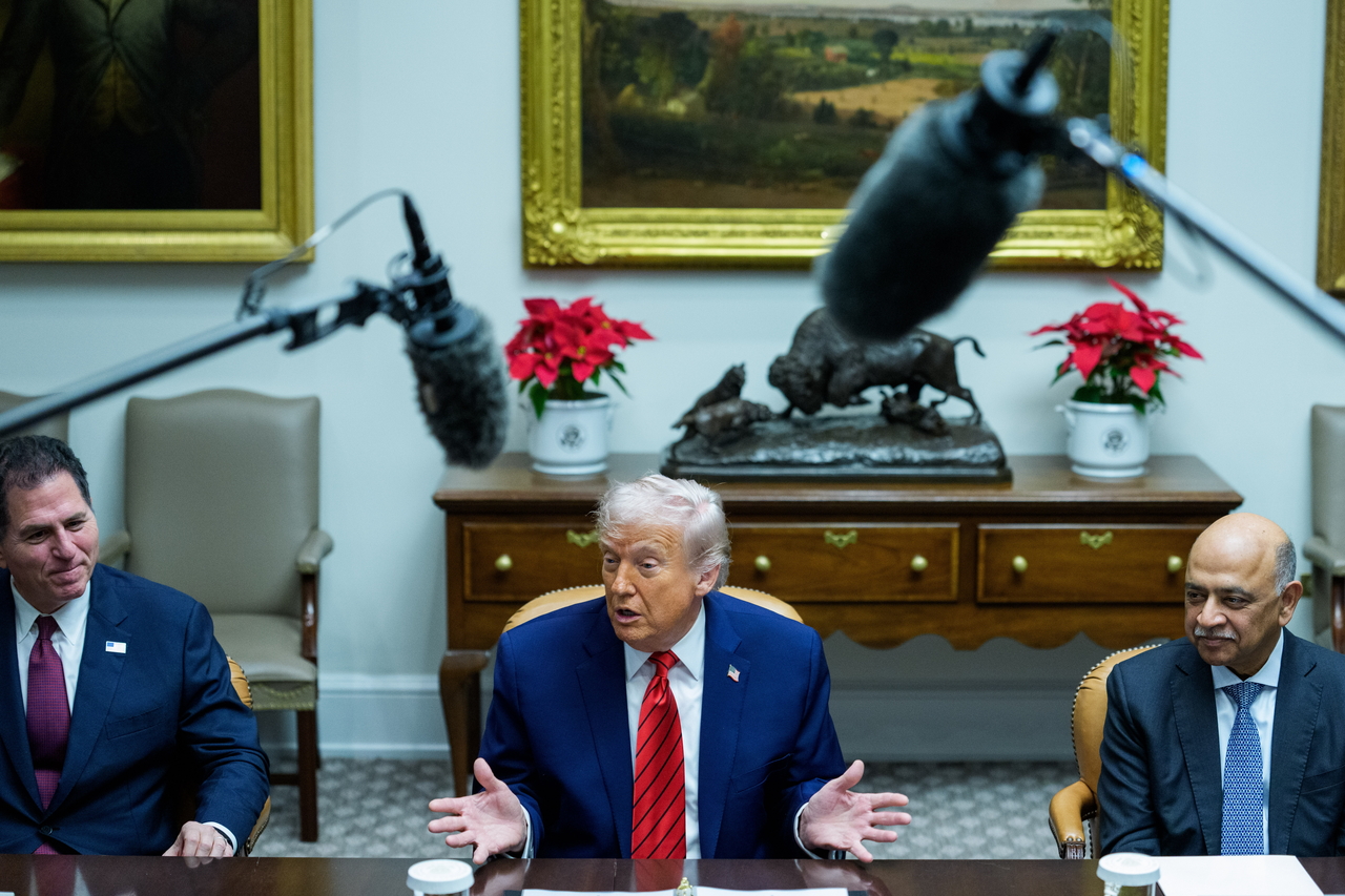 US President Donald J Trump (center) makes remarks in a roundtable in the Roosevelt Room of the White House in Washington, Wednesday. (EPA-Yonhap)