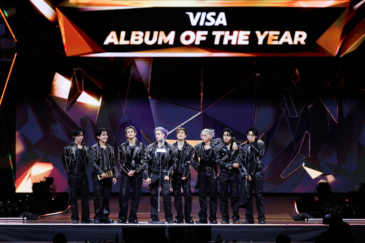 Stray Kids deliver an acceptance speech after winning album of the year at the Mnet Asian Music Awards held at Kai Tak Sports Park in Hong Kong on Saturday. (CJ ENM)