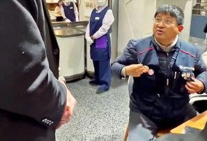 Backlash grows after department store asks customer to remove union vest