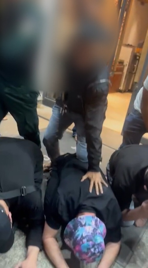 This photo shows suspects in a murder case inside a Cambodian scamming compound arrested in Phnom Pehn, Cambodia, in late November. (Courtesy of National Intelligence Service)