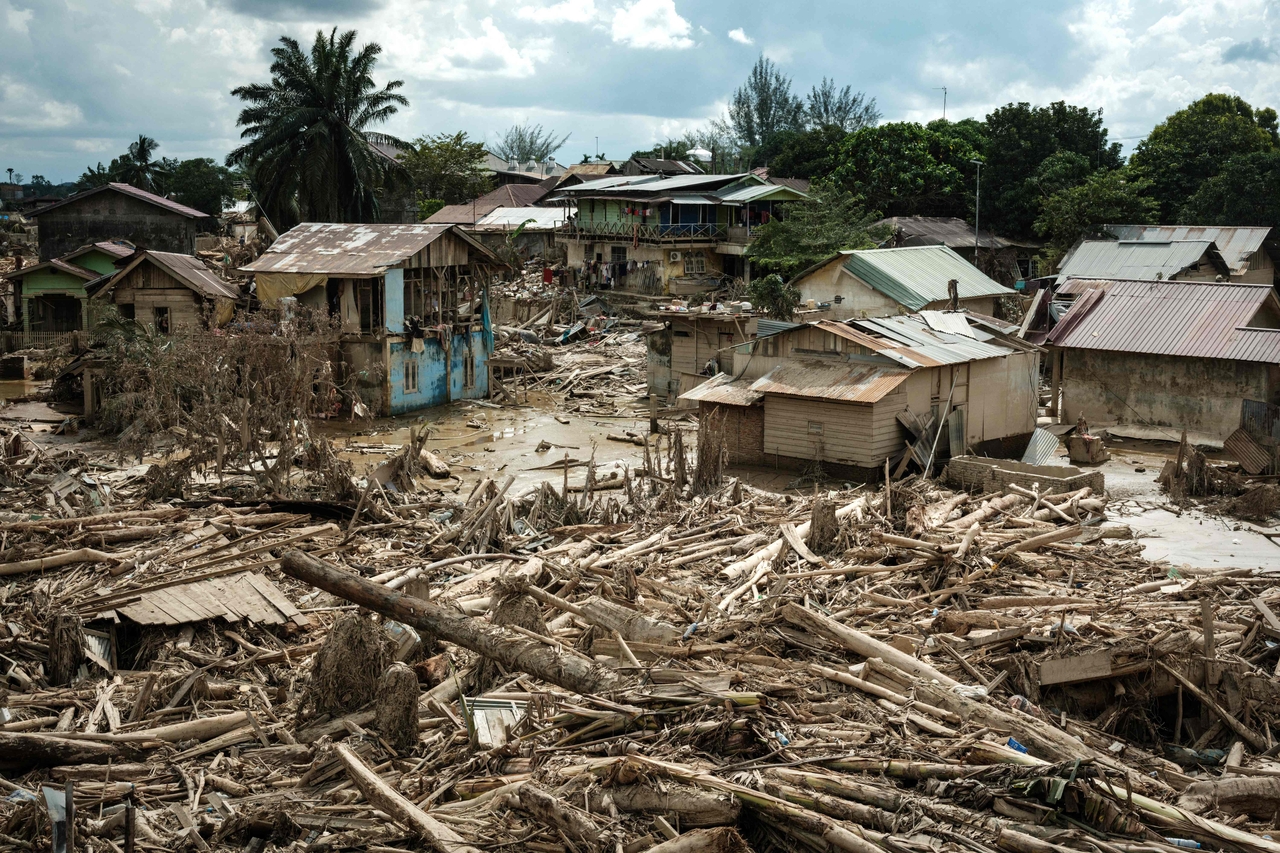 Damaged houses following a flash flood remain standing in Aceh Tamiang, Northern Sumatra, Indonesia, Saturday. (AFP-Yonhap)
