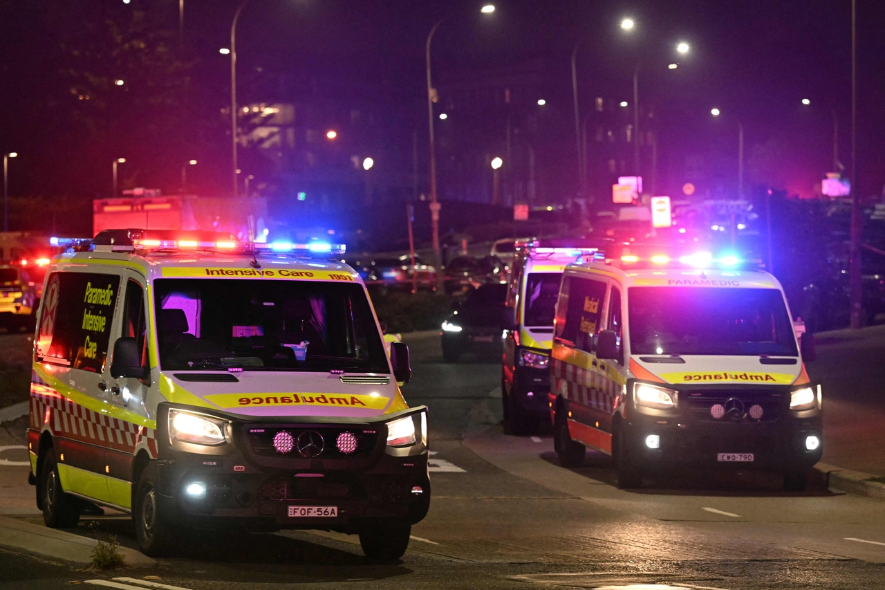 Ambulances move around at Bondi Beach after a reported shooting in Sydney, Sunday. (AFP-Yonhap)