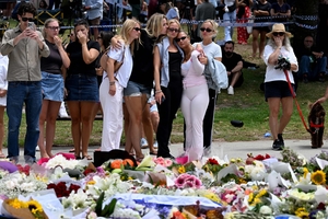 Father and son gunmen kill 15 on Australia's Bondi Beach