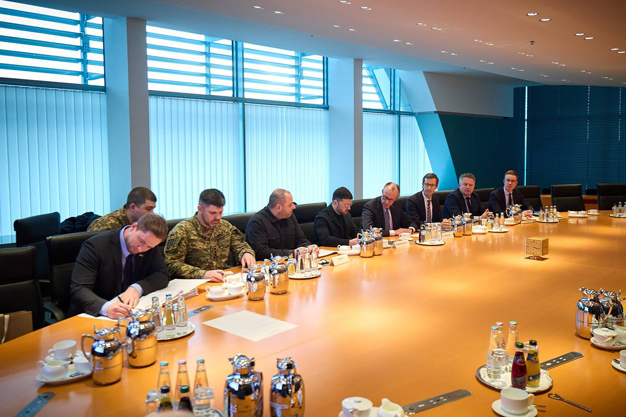 German Chancellor Friedrich Merz (fourth from right) sits next to Ukrainian President Volodymyr Zelenskyy (fifth from right) during a meeting in Berlin, Sunday.   UPI-Yonhap