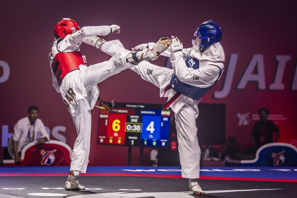 Athletes compete in taekwondo at the Fujairah 2025 World Taekwondo Cadet Championships. (World Taekwondo)