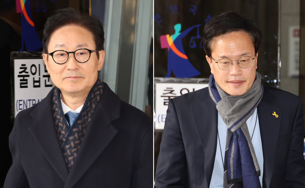 Park Beom-kye (left) and Rep. Park Ju-min of the ruling Democratic Party of Korea leave the Seoul Southern District Court on Friday. (Yonhap)