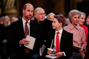 UK's Prince William and son George volunteer at homelessness charity