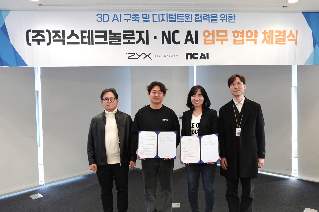 (From left) ZYX Technology CEO Eom Shin-jo, ZYX Technology Chair Choi Jong-bok, NC AI CEO Lee Yeon-soo, NC AI CTO Kim Min-jae pose for a photo during the signing ceremony on Friday. (Zyx Technology)